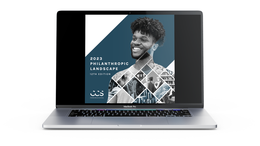 An open laptop computer against a white background showing the front cover of the 2023 Philanthropic Landscape, 12th Edition report.