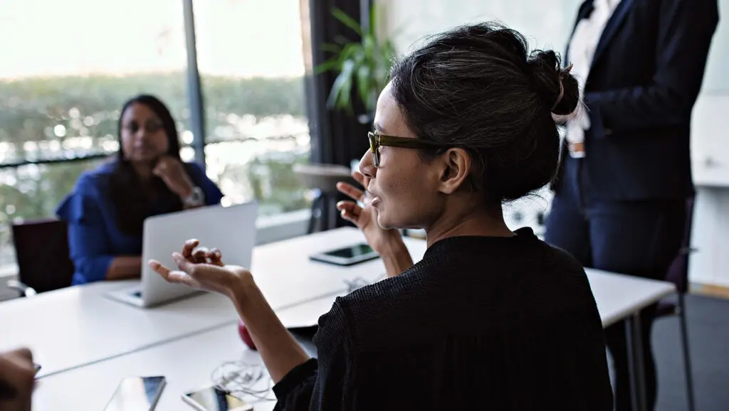 A picture of a major gift officer making a blended gift proposal in an office.
