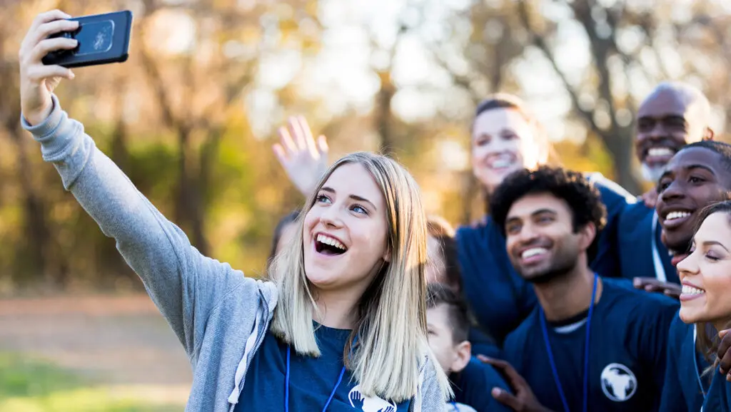 A picture of the next donor generation taking a selfie while volunteering.