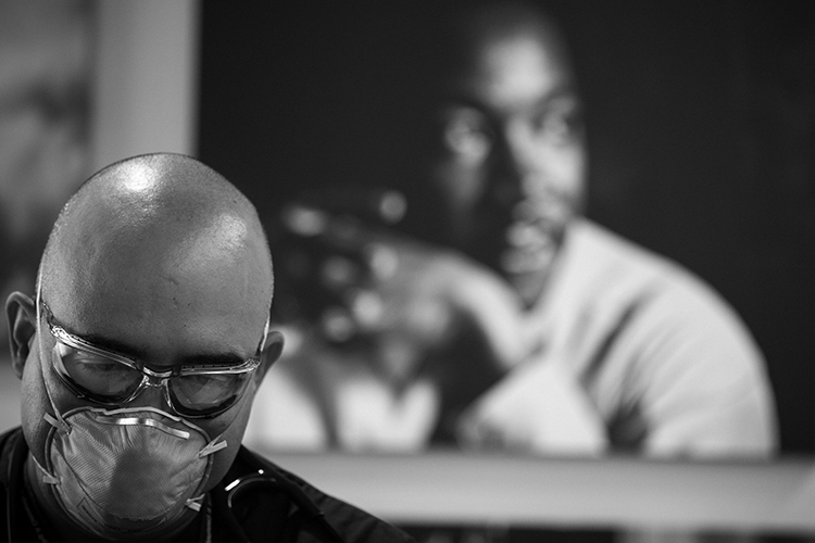 A picture of an MLKCH worker wearing a mask and goggles.