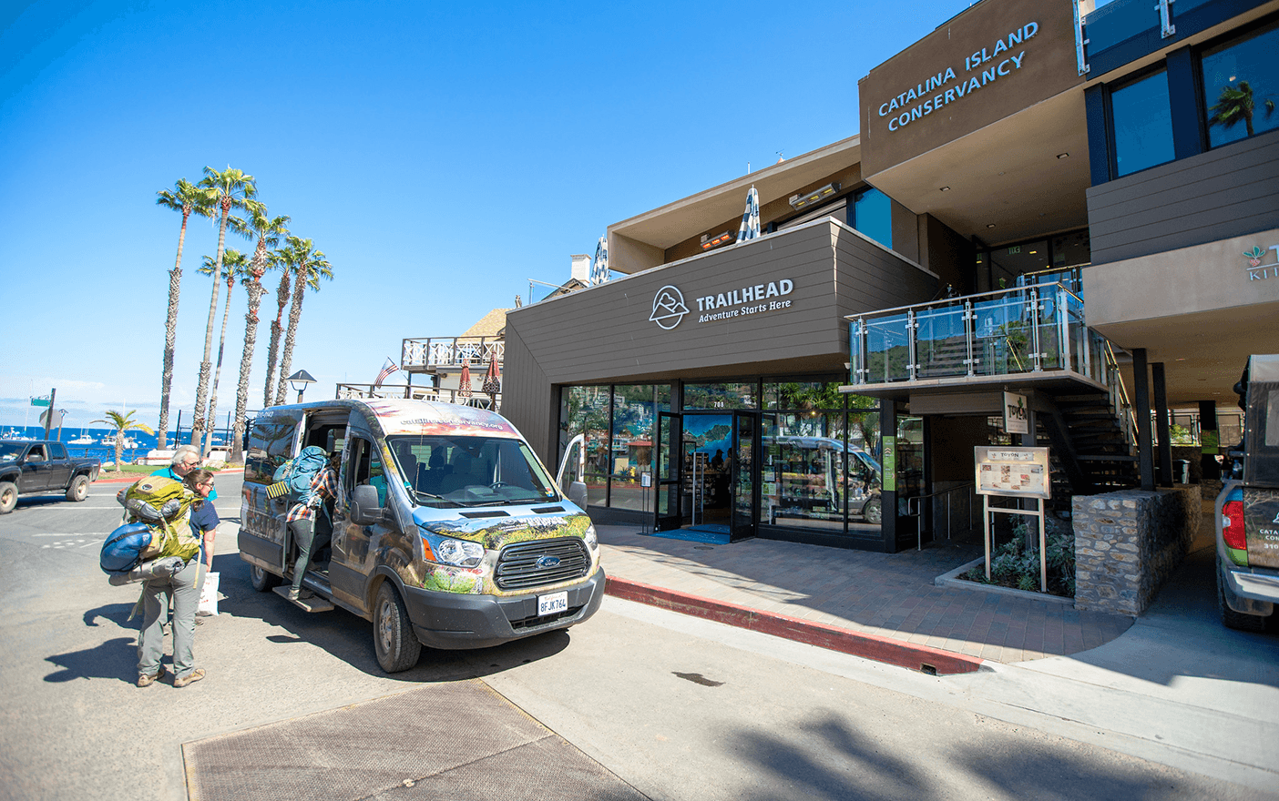 Hikers in front of the Catalina Island trailhead and visitors ccenter.