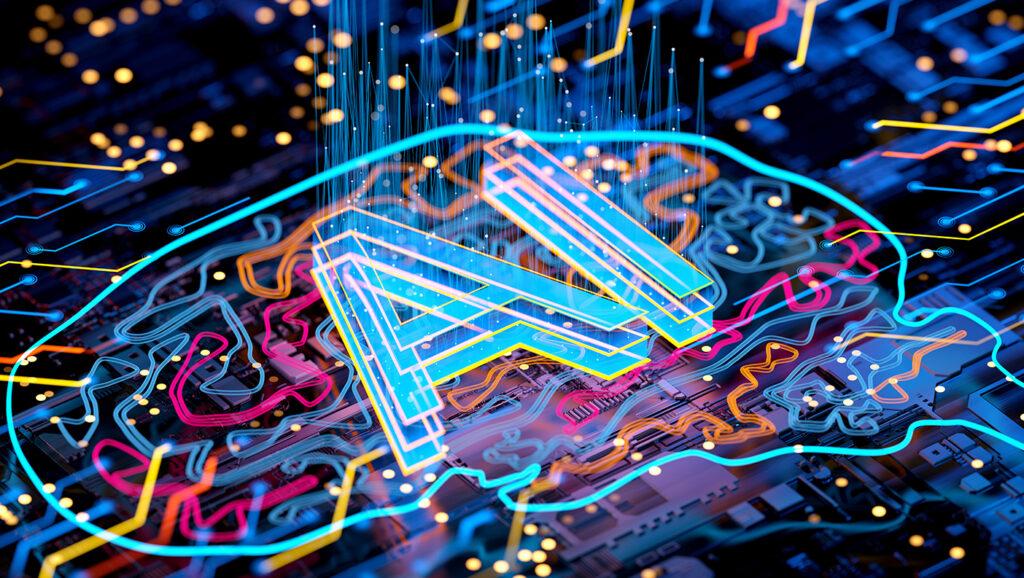 A graphic of a lit-up and colorful chip board with a circuit in the shape of a brain and "AI" at its center.