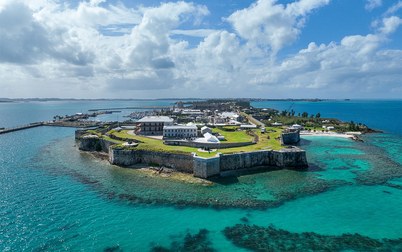 Aerial view of beautiful blue water surrounding the island on which the National Museum of Bermuda sits.