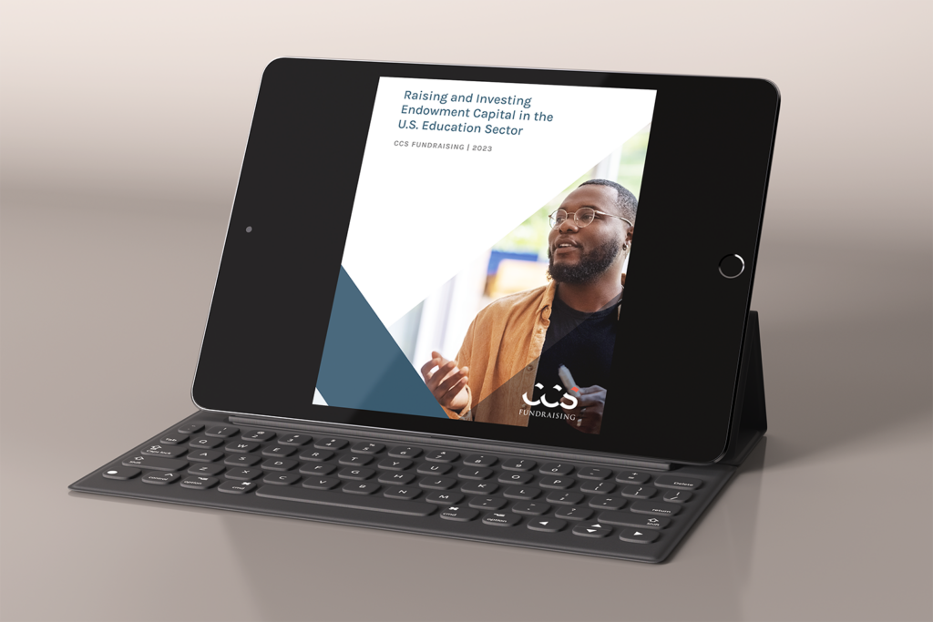 An iPad showing the front cover of CCS's August 2023