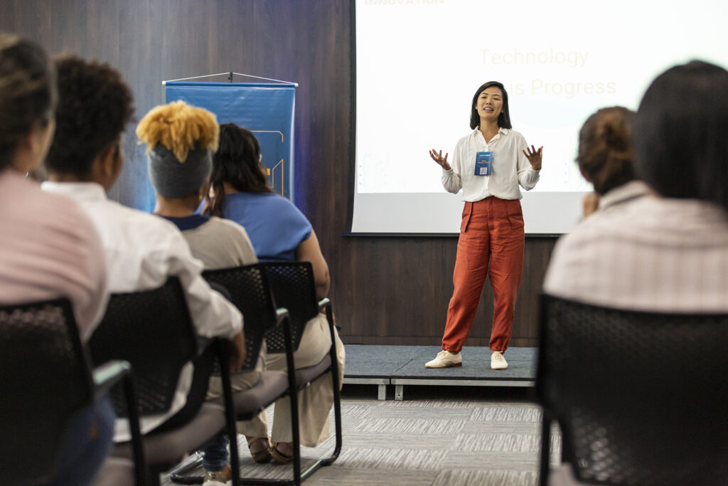 A speaker presents to a room of association members as part of an education event hosted by the association foundation.